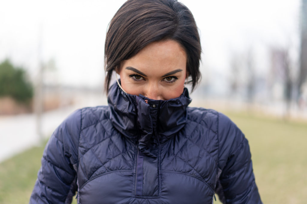Model wearing cold weather running gear.